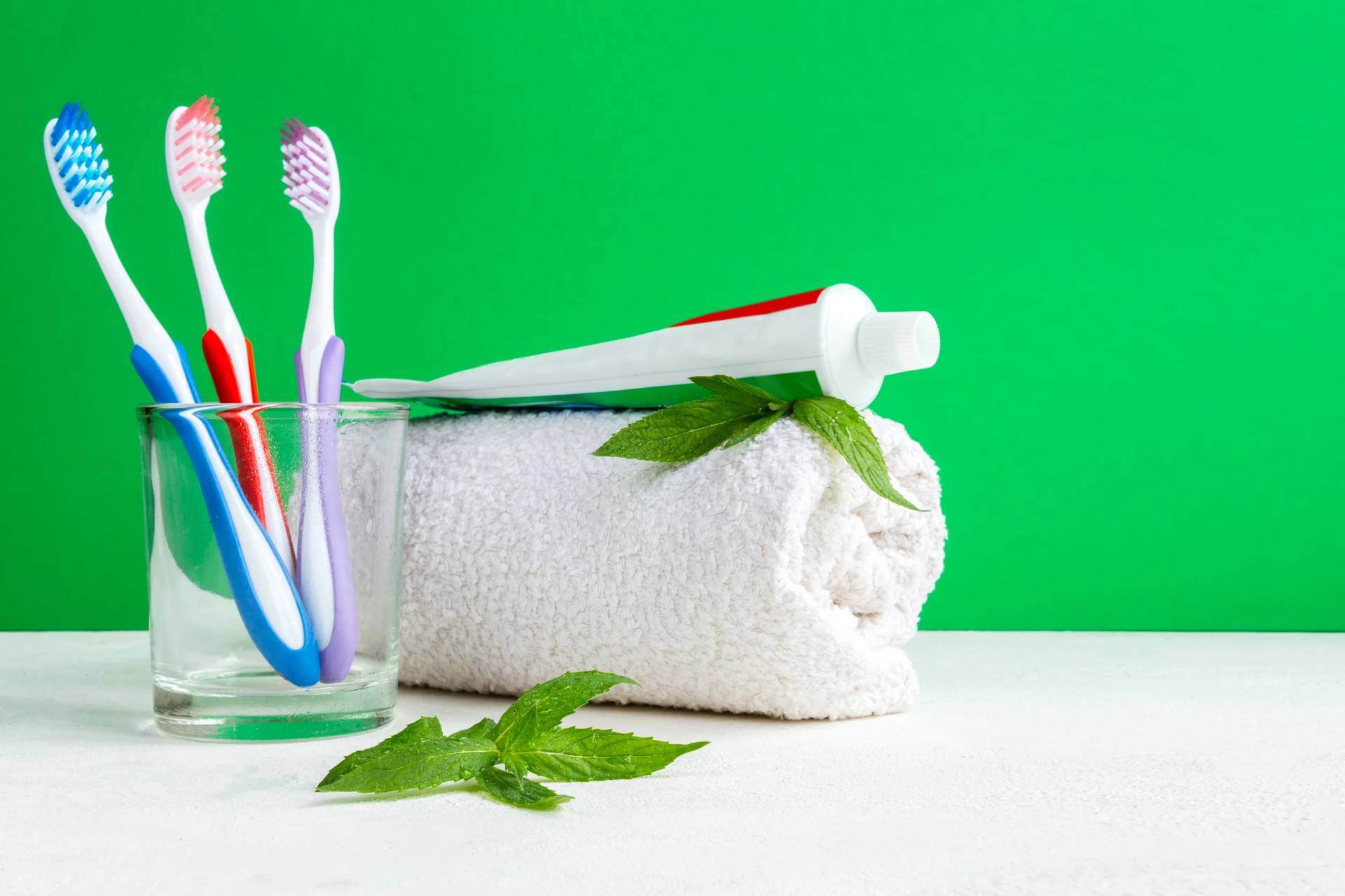 Healthy teeth toothbrush in a glass and toothpast