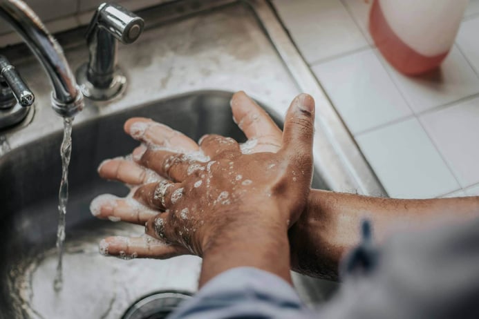 Man washing his hands