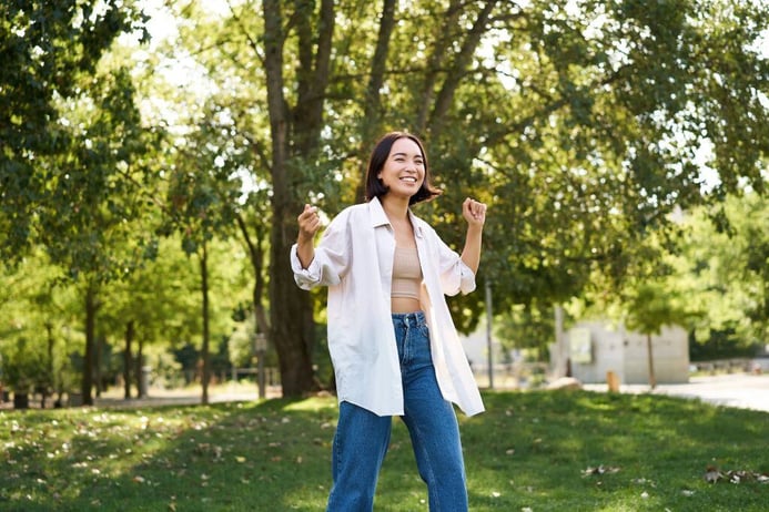 Portrait of happy girl dancing