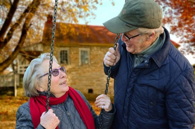 How does having a spouse impact a senior's health insurance options?