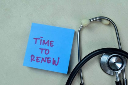 words time to renew written on a blue sticky note with a stethoscope on the side