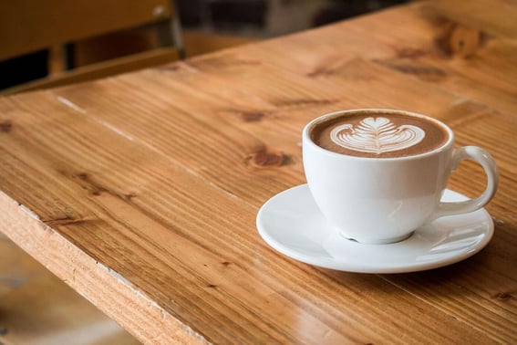 Cup of coffee on a wooden table